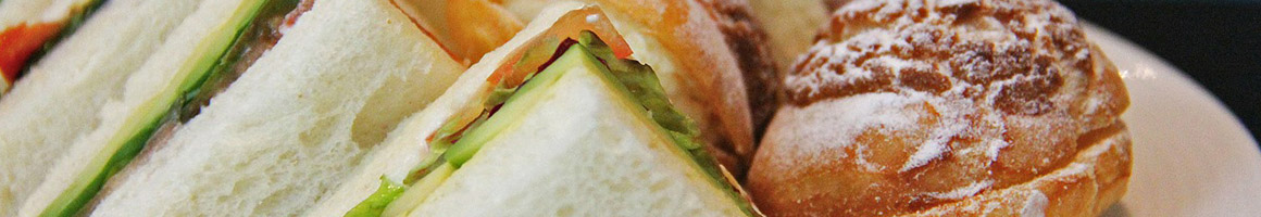 Eating Deli Sandwich at Booeymonger restaurant in Washington, DC.